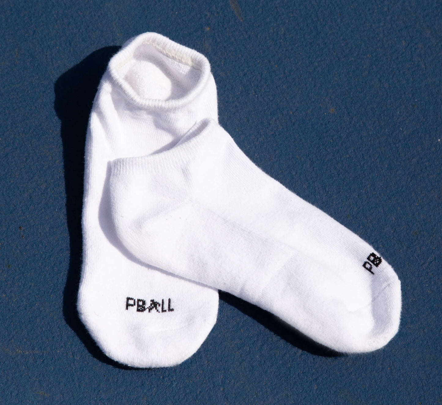 White short pickleball socks with PBALL logo