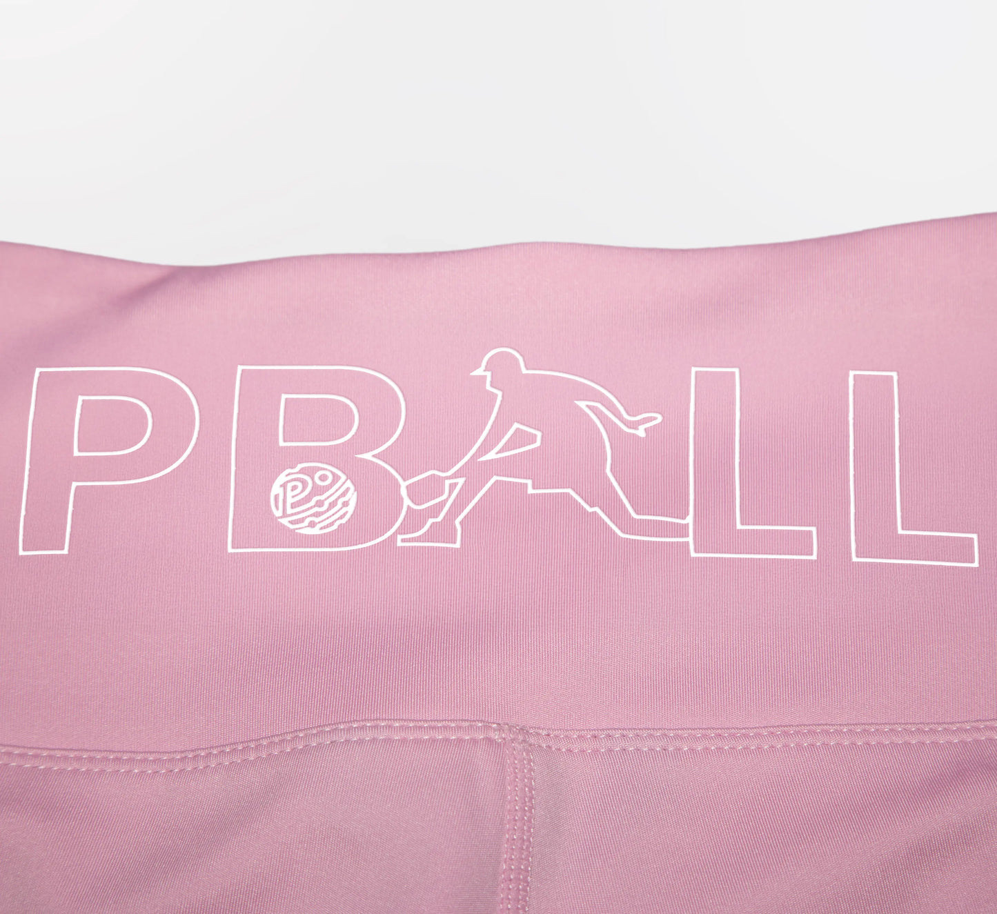 Pink biker shorts with PBALL logo on a white background