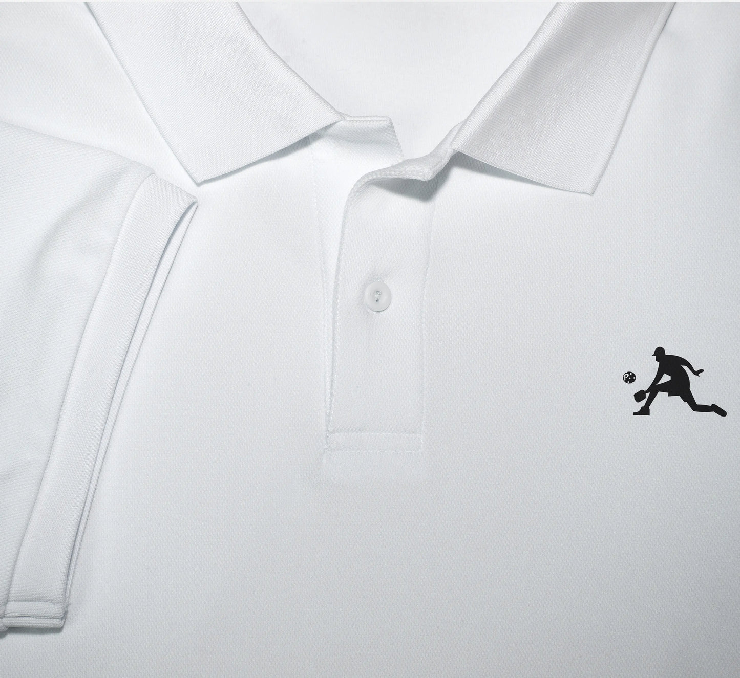 White polo shirt with a black PBALL logo on a light gray background Blanc