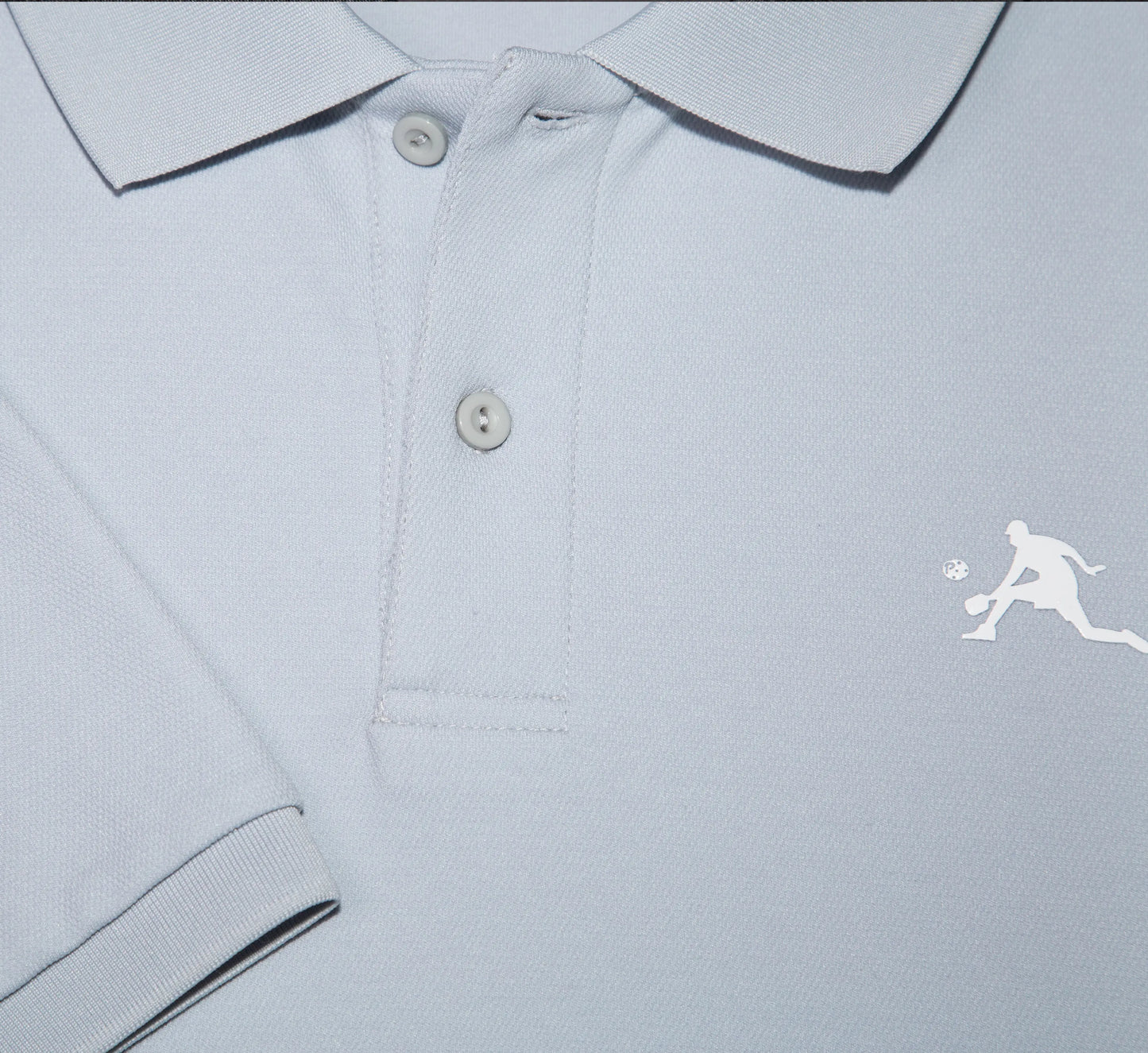 Light Grey polo shirt with a white PBALL logo on a white background Gris