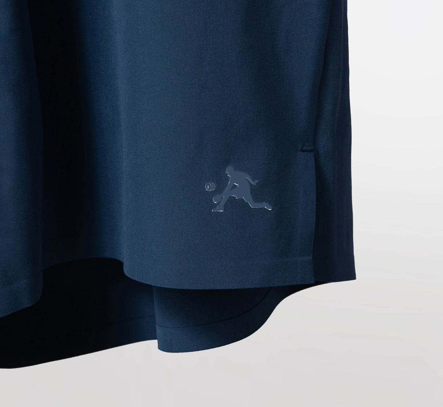 Blue shorts with a small PBALL logo on a light gray background Bleu