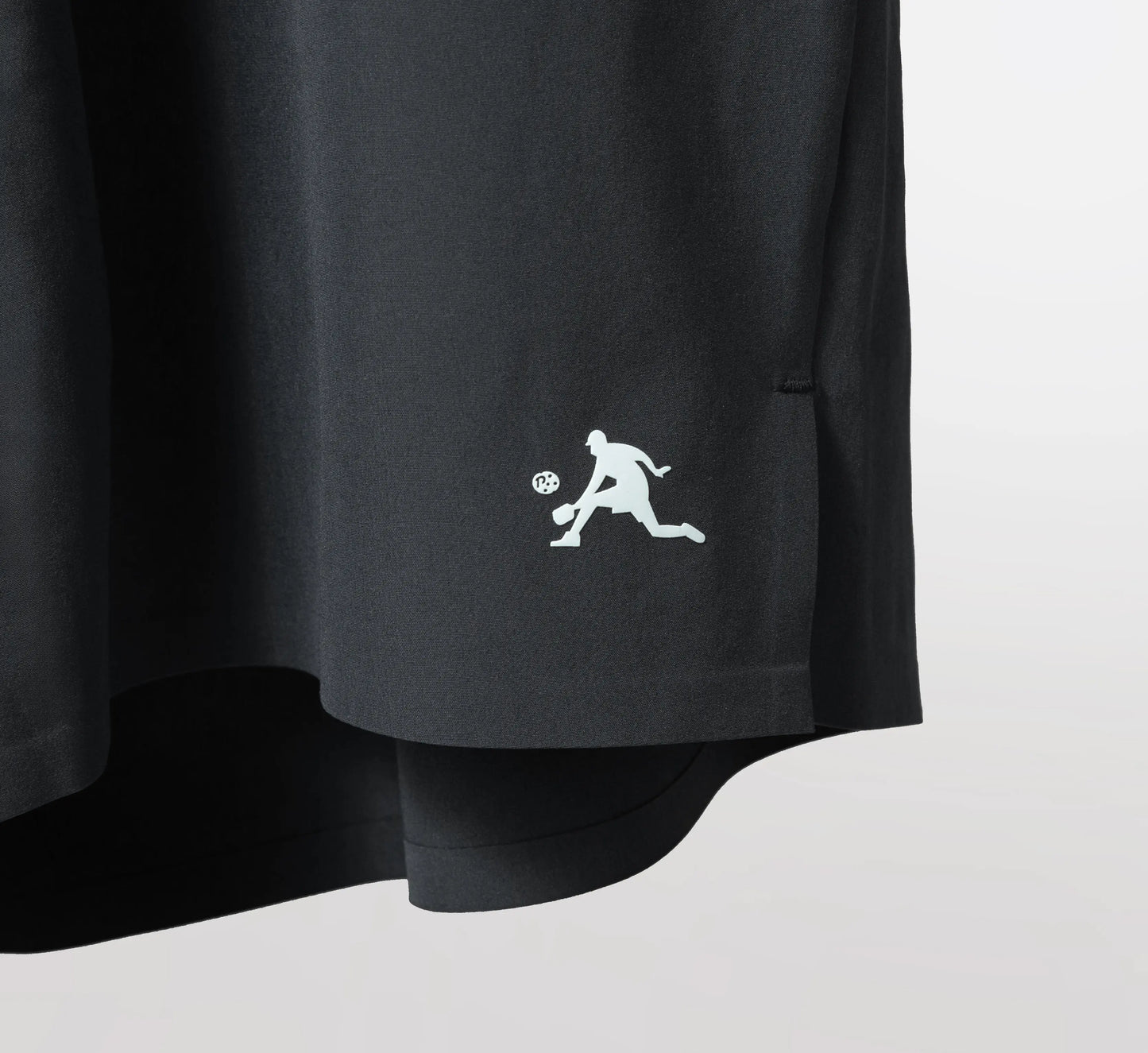Black shorts with a white PBALL logo on a light gray background Noir