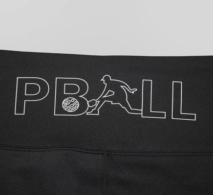 Black biker shorts with a white PBALL logo on a gray background