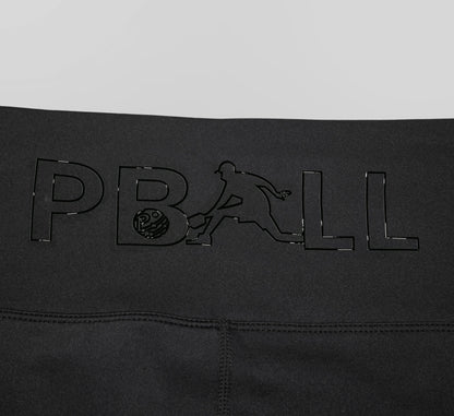 Black biker shorts with embossed PBALL logo on a gray background