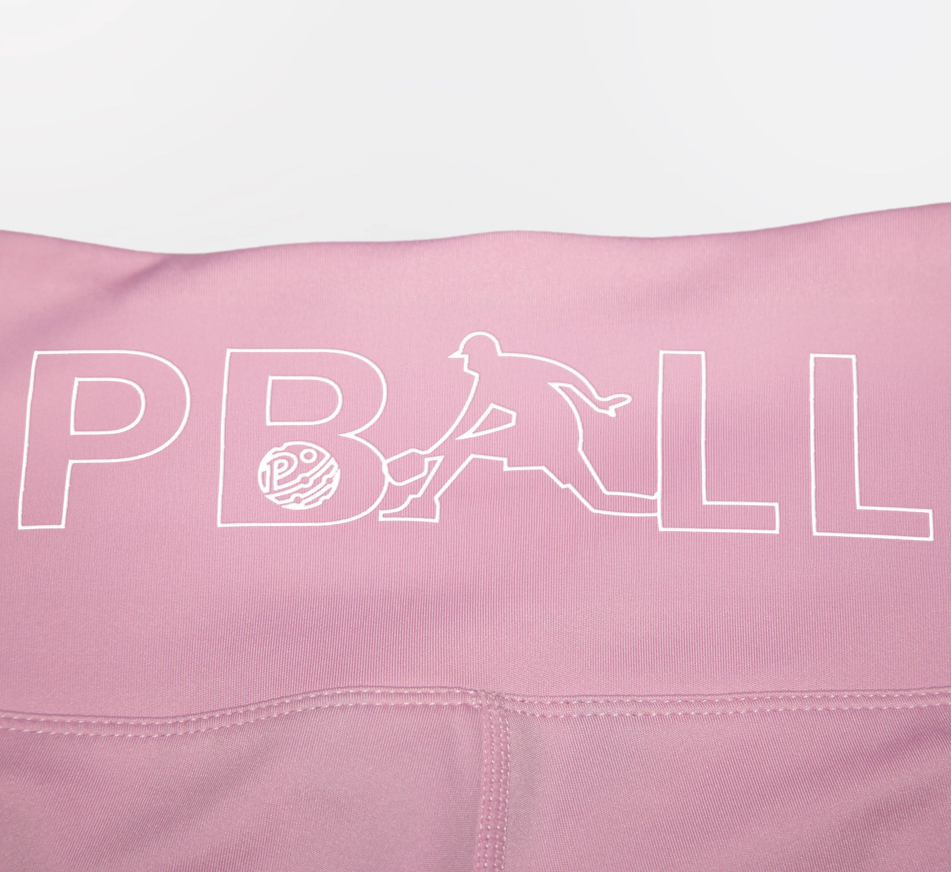 Pink biker shorts with PBALL logo on a white background