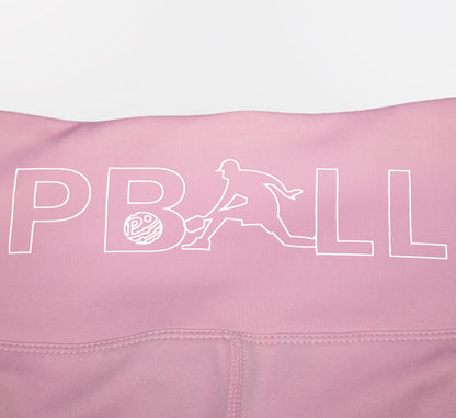 Pink biker shorts with PBALL logo on a white background