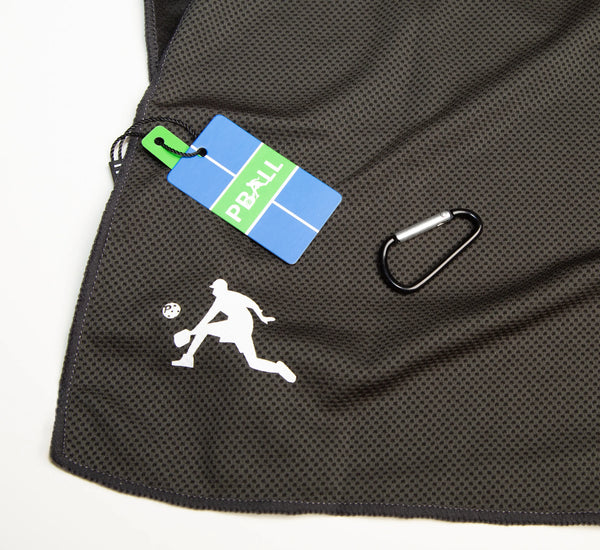 Black cooling towel with a silhouette of a person playing pickleball and a visible PBALL tag on a white background Noir
