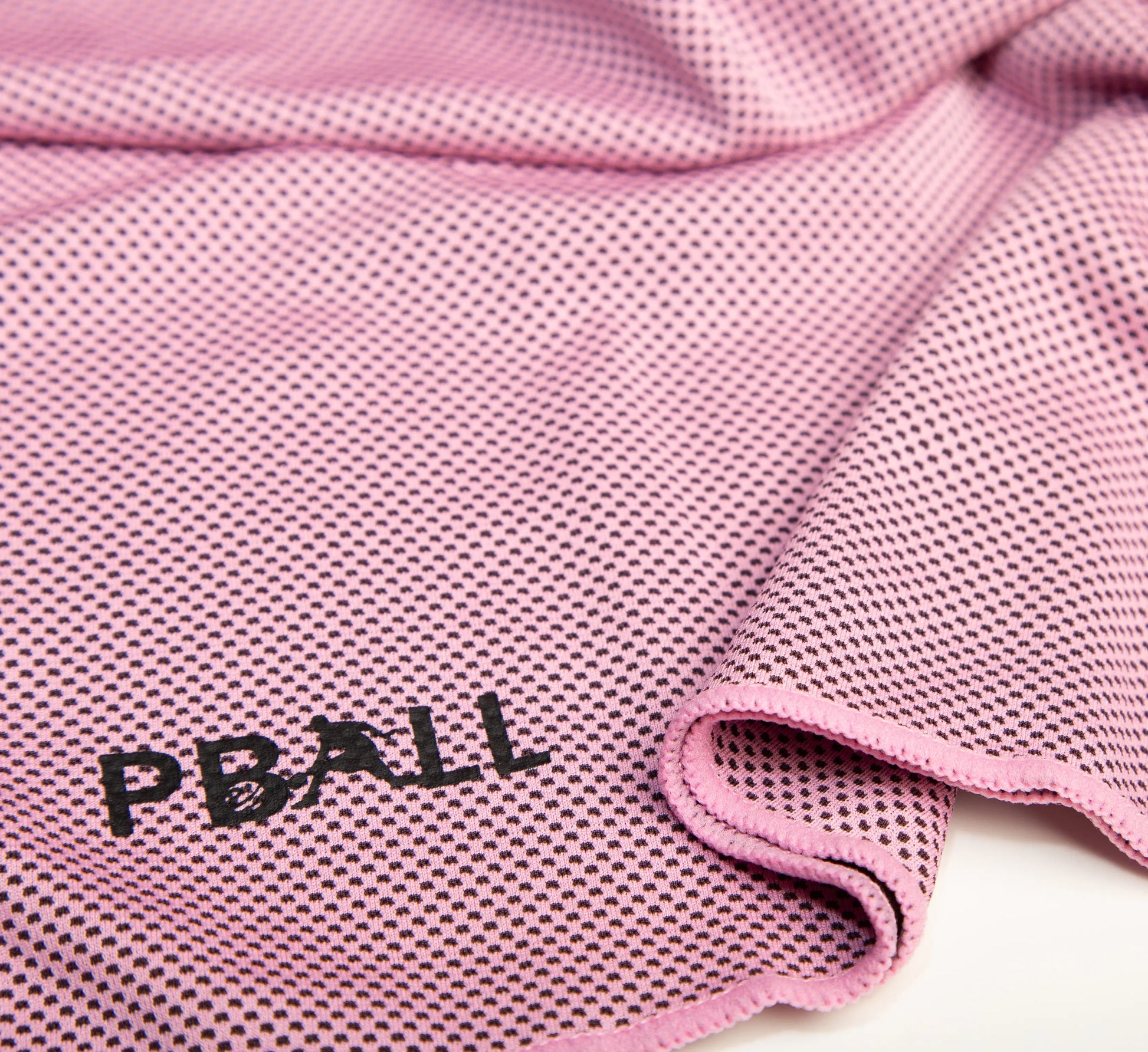 Pink textured towel fabric with PBALL branding on a white background Rose