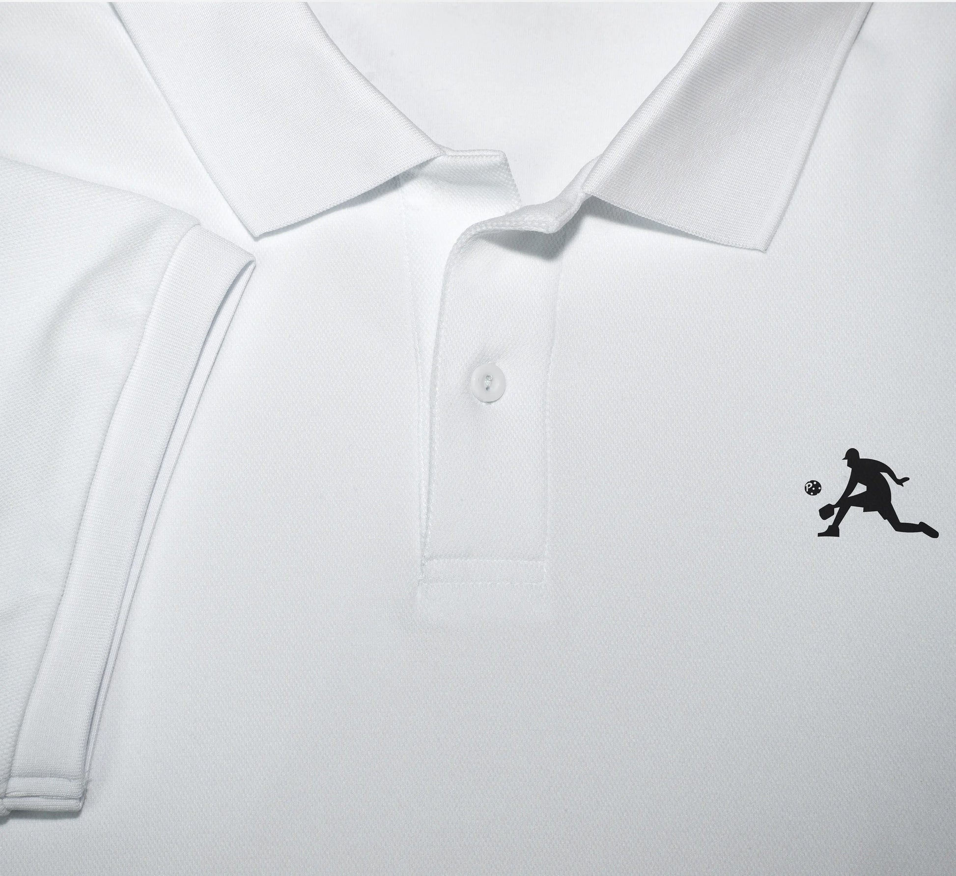 White polo shirt with a black PBALL logo on a light gray background Blanc
