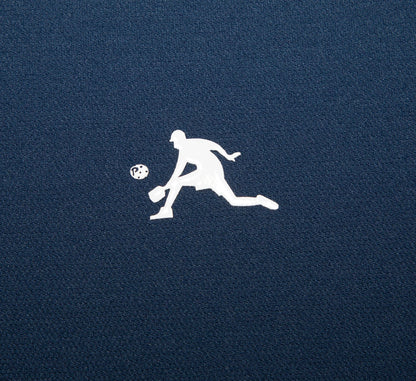 white silhouette of a pickleball player on a navy Blue textured background Bleu