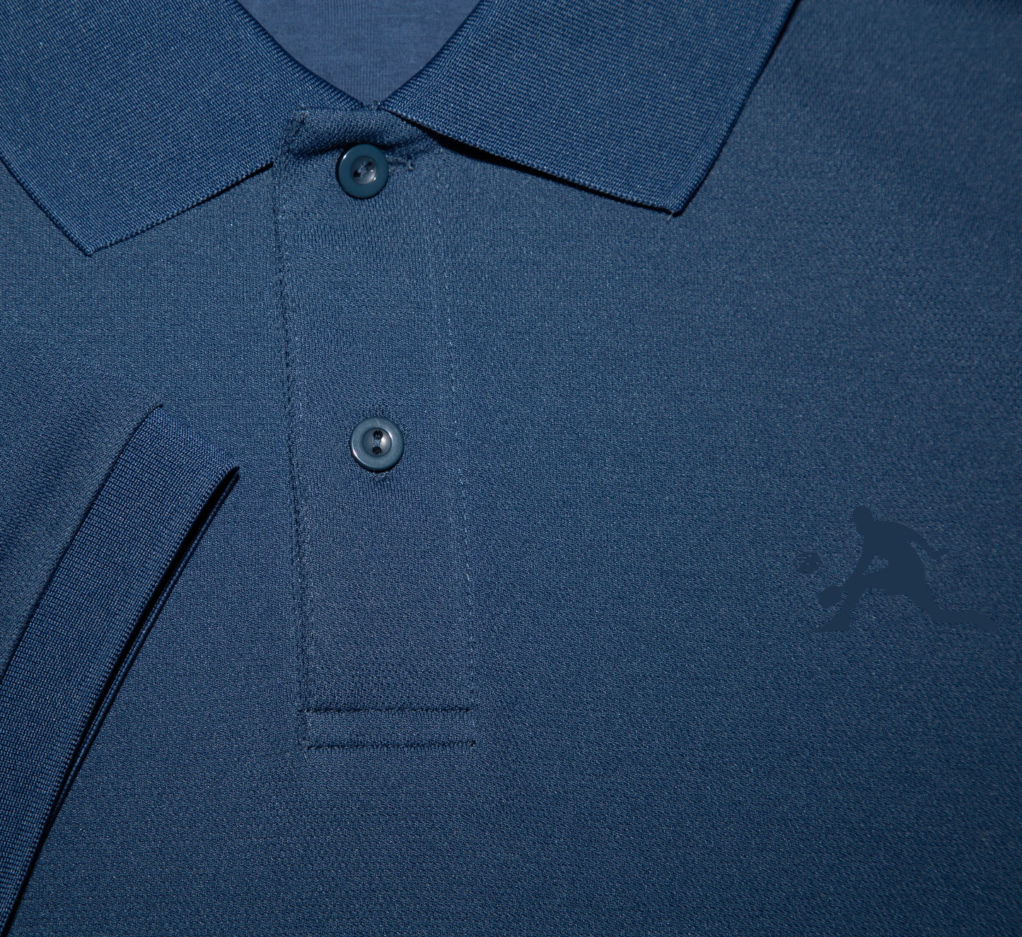 Close-up of a Blue polo shirt with buttons and a PBALL logo Bleu