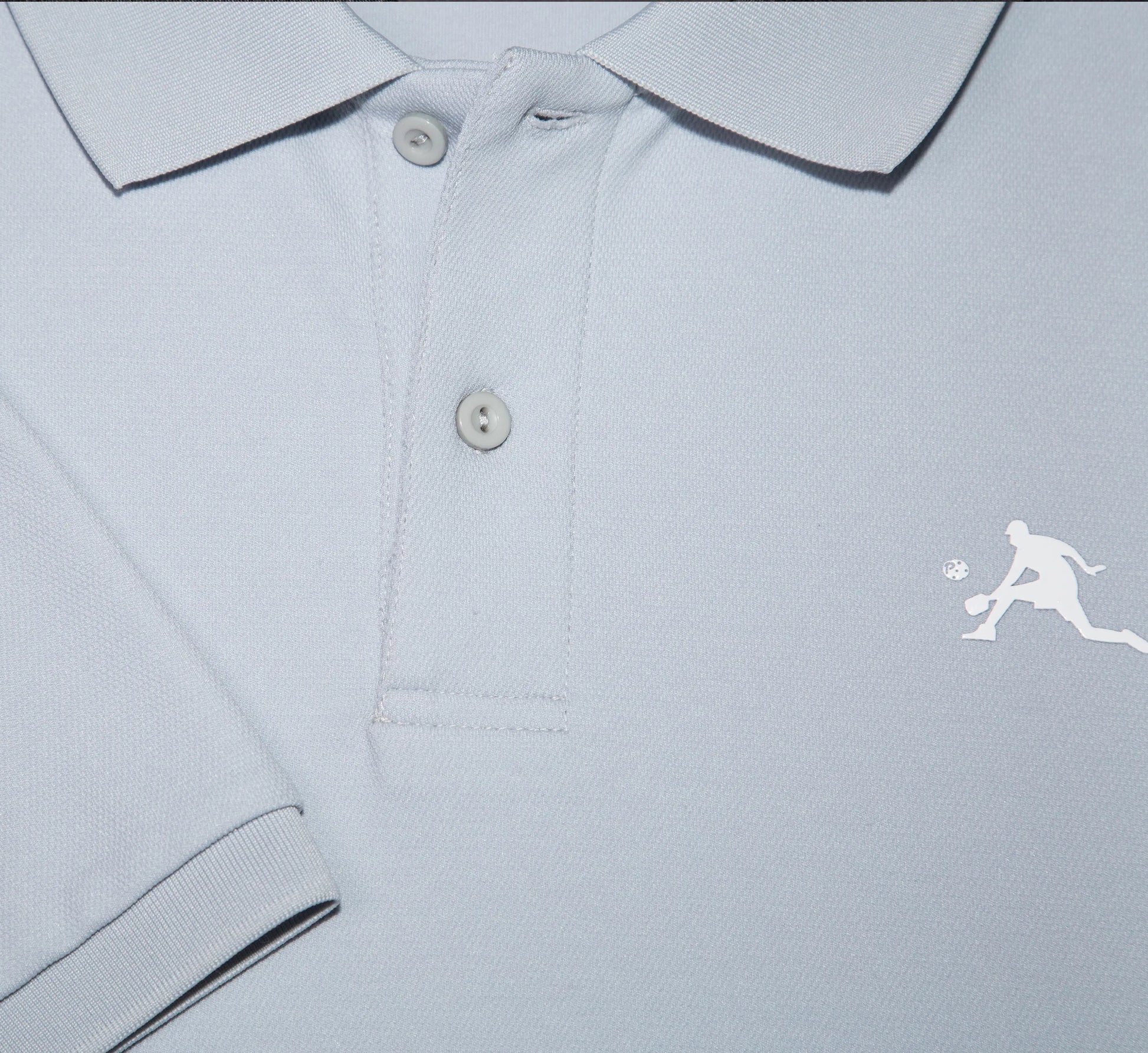 Light Grey polo shirt with a white PBALL logo on a white background Gris