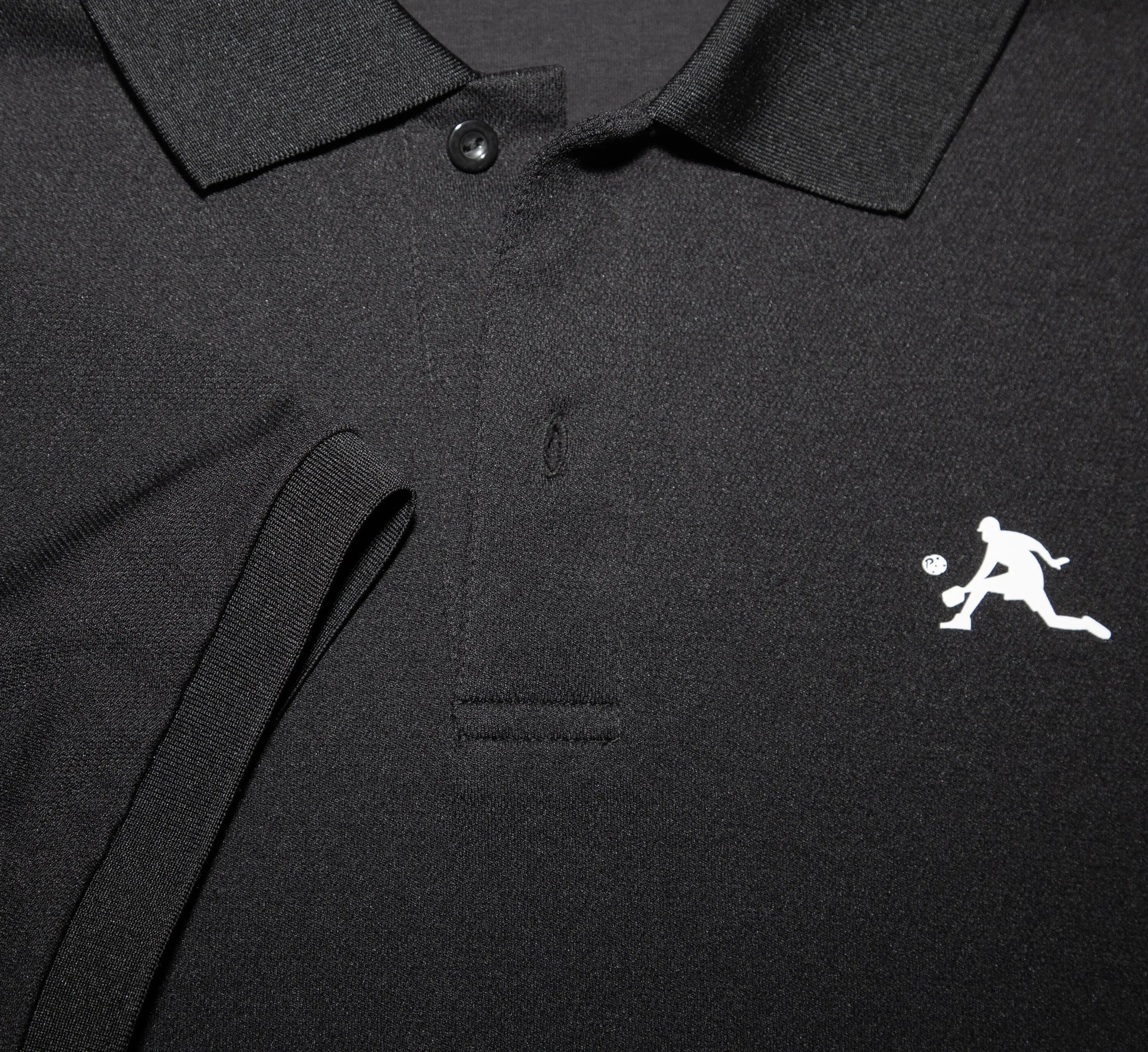 Black polo shirt with a white PBALL logo on the chest Noir
