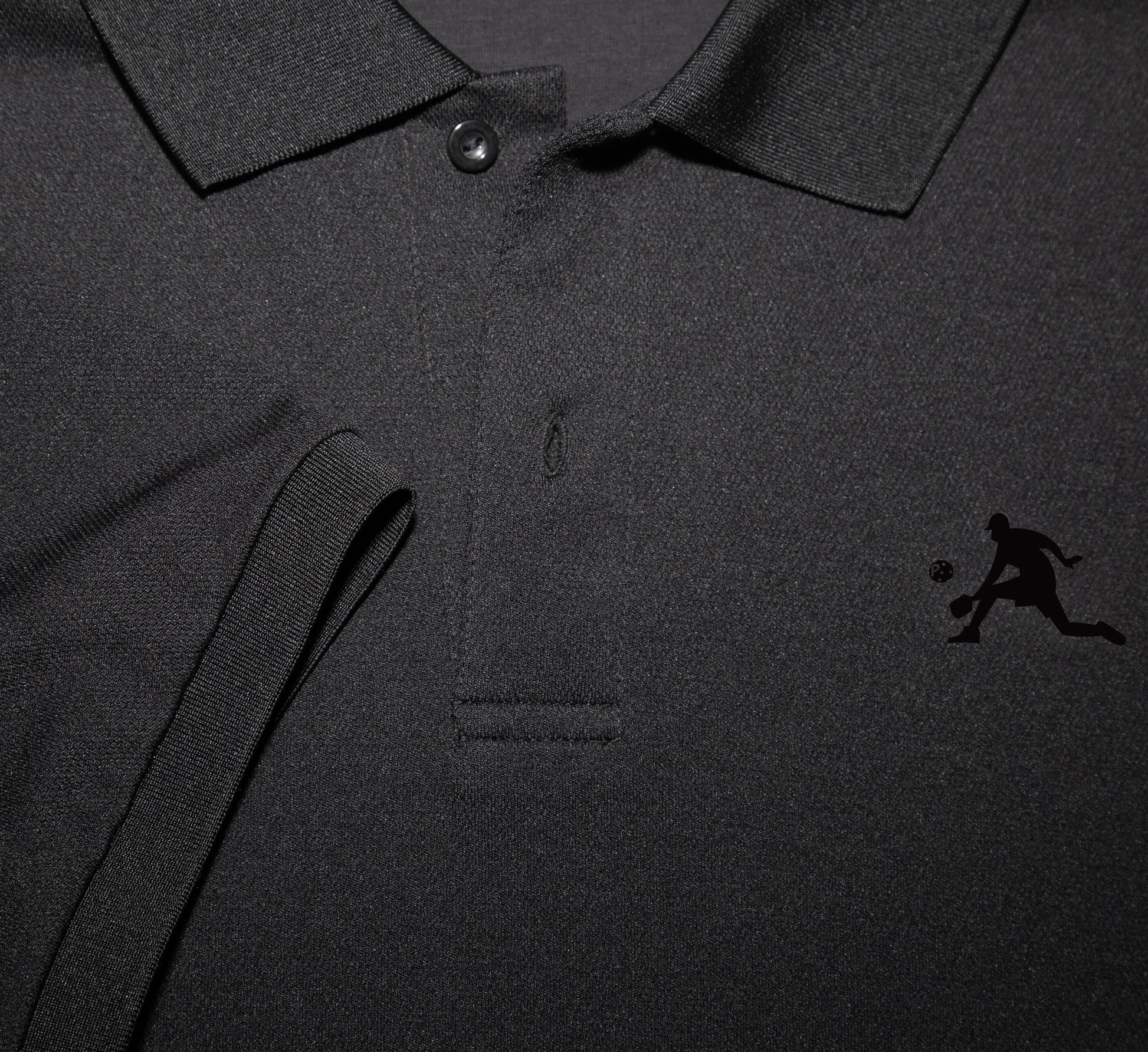Black polo shirt with a small PBALL logo design on the chest Noir