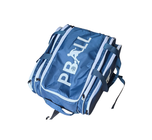 A blue multi-pocket pickleball bag with white piping and a large white 'PBALL' logo printed on the front, shown against a plain white background.