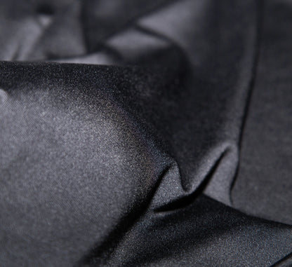 Close-up of Black t-shirt fabric with folds Noir